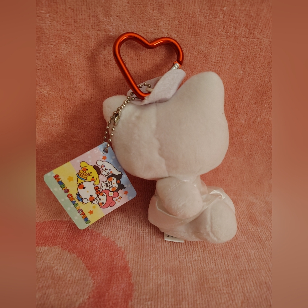 EXCLUSIVE - Hello Kitty Nurse Kitty Purse Pal Plushie & Game Bag Charm - Picture 7 of 9